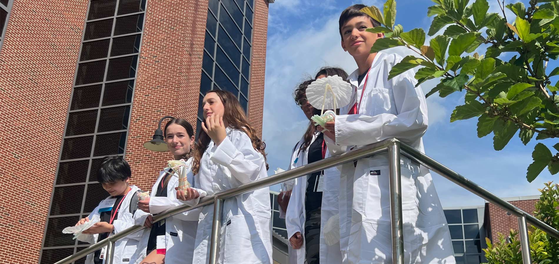 The moment of truth. Students put their landing system to the test and provide the excitement of a scientific experiment. There was about a 4 foot drop and some groups achieved success.