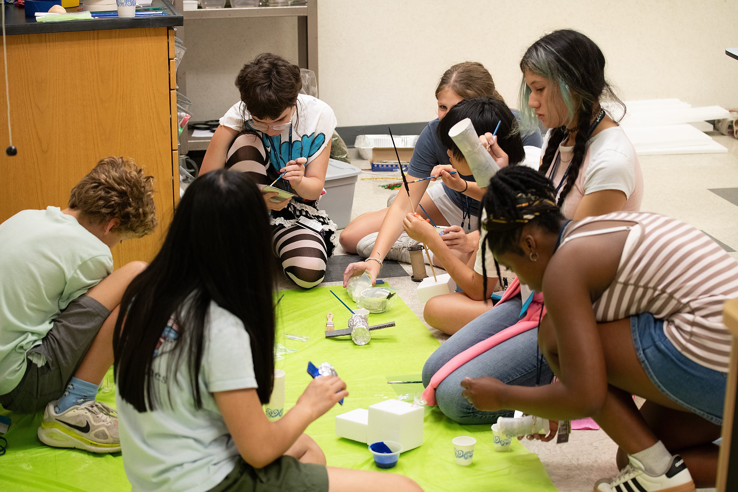 Students are assigned to a teacher and work as teams on their final Mars habitat project.