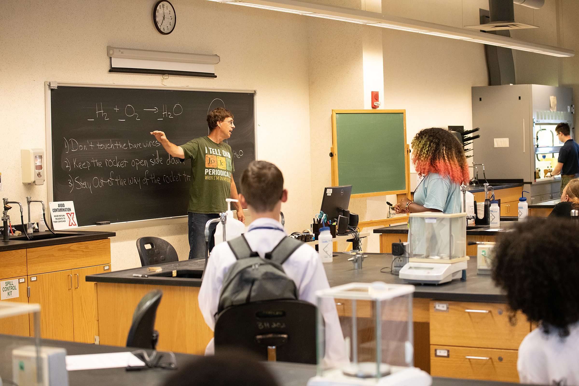 One of the new features of the 2026 STEM YEA was the evening programs, here Dr. Dan Blanchard leads an experiment in the production of rocket fuel in microcosm.