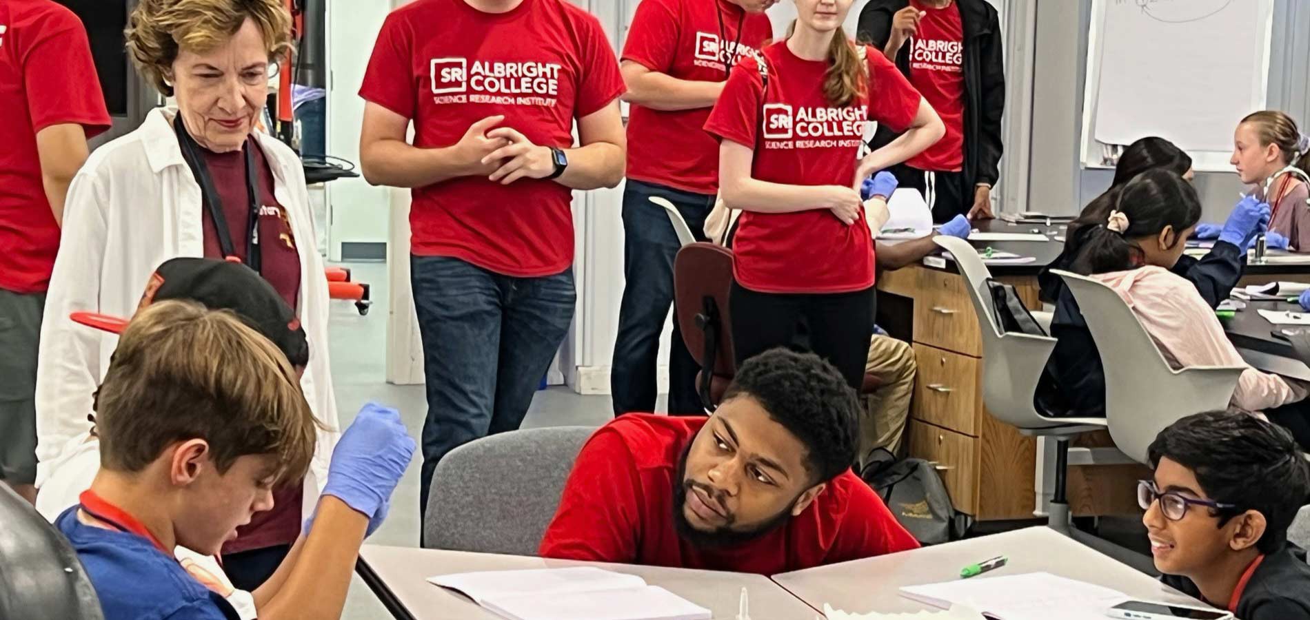 SRI staff engaged in a teaching moment